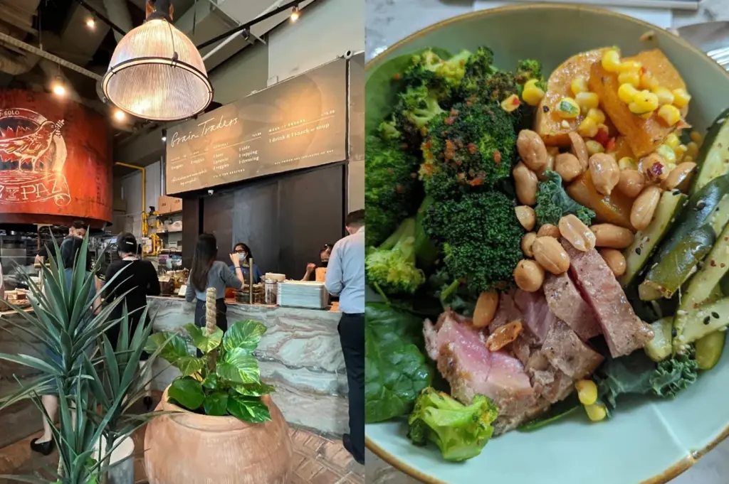 A split image. Left side: The indoor counter of "Grain Traders," a healthy eatery. Staff members in masks are serving customers behind a marbled counter. A large red industrial-style silo and a potted plant are visible in the foreground. Right side: A healthy grain bowl featuring seared tuna slices, charred broccoli, roasted pumpkin with corn, peanuts, and fresh kale in a light green ceramic bowl.